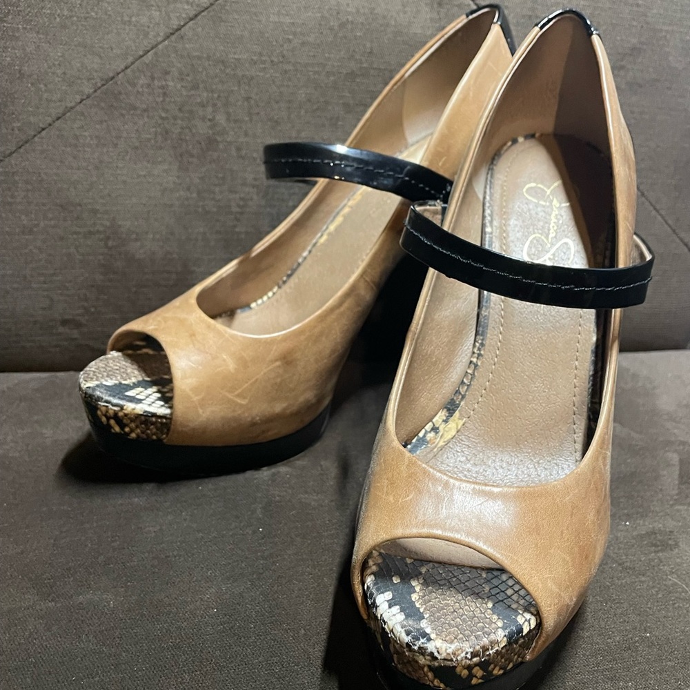Jessica Simpson leather peep-toe high heels with snakeskin accent.
